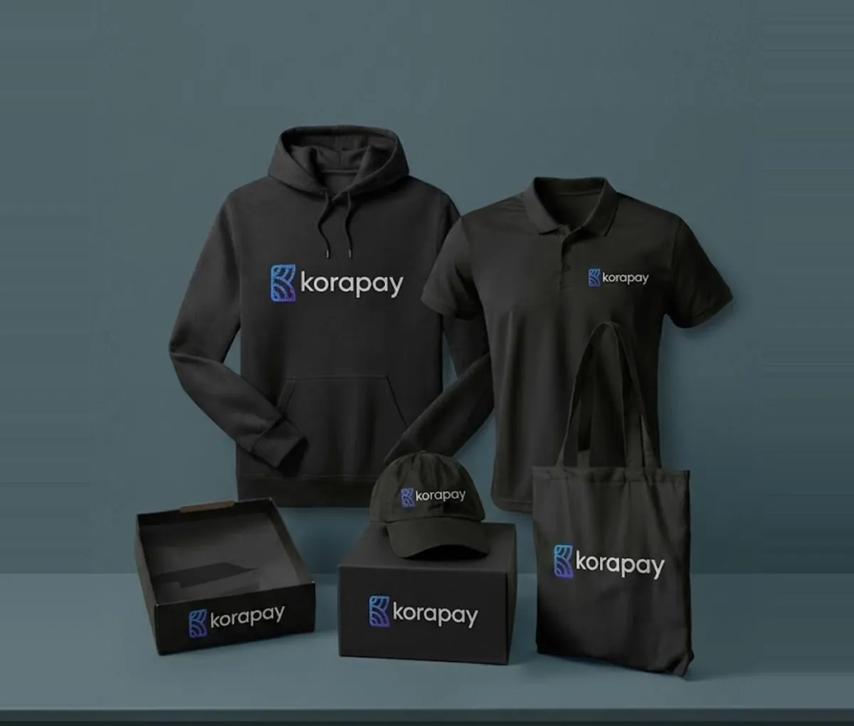 korapay branded merch — hoodie, polo, cap, box and tote